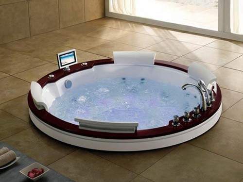 Hydra Round Sunken Whirlpool Bath With TV & Oak Surround. 1900x1900.