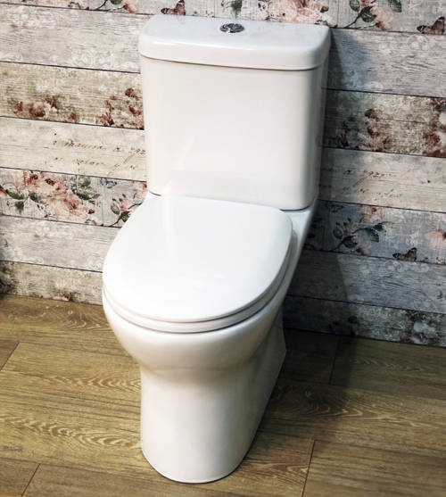Example image of Oxford Unison Breeze Rimless Toilet Pan With Cistern & Soft Close Seat.
