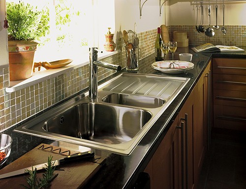 Example image of Rangemaster Manhattan 1.5 Bowl Stainless Steel Sink, Right Hand Drainer.