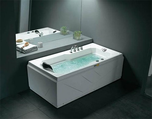 Example image of Hydra Corner whirlpool Bath With Bath Panels. 1600x800 (Right Handed).