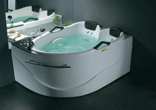 Example image of Hydra Corner Whirlpool Bath With Bath Panel. 1730x1260 (Left Handed).