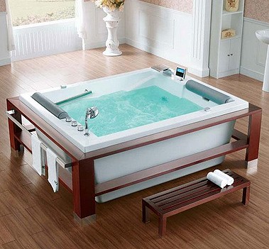 Example image of Hydra Large Freestanding Whirlpool Bath With Head Rests. 2100x1700mm.