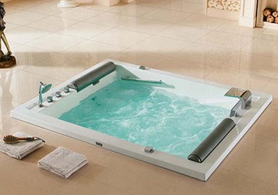 Example image of Hydra Large Sunken Whirlpool Bath With Head Rests. 1900x1500mm.
