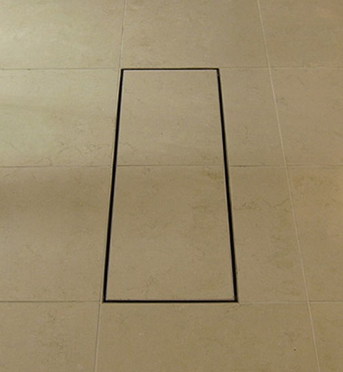 Example image of Waterworld Stainless Steel Wetroom Tile Channel With Side Outlet. 815mm.